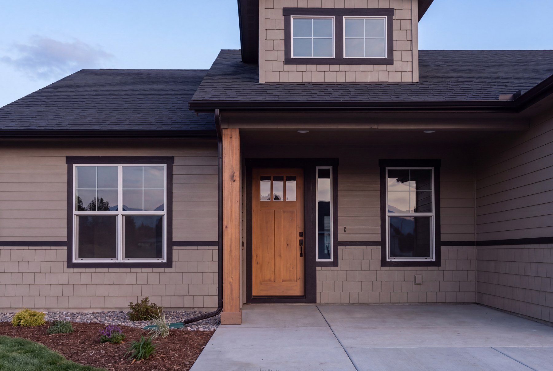 The Pendleton — covered front entry with craftsman door
