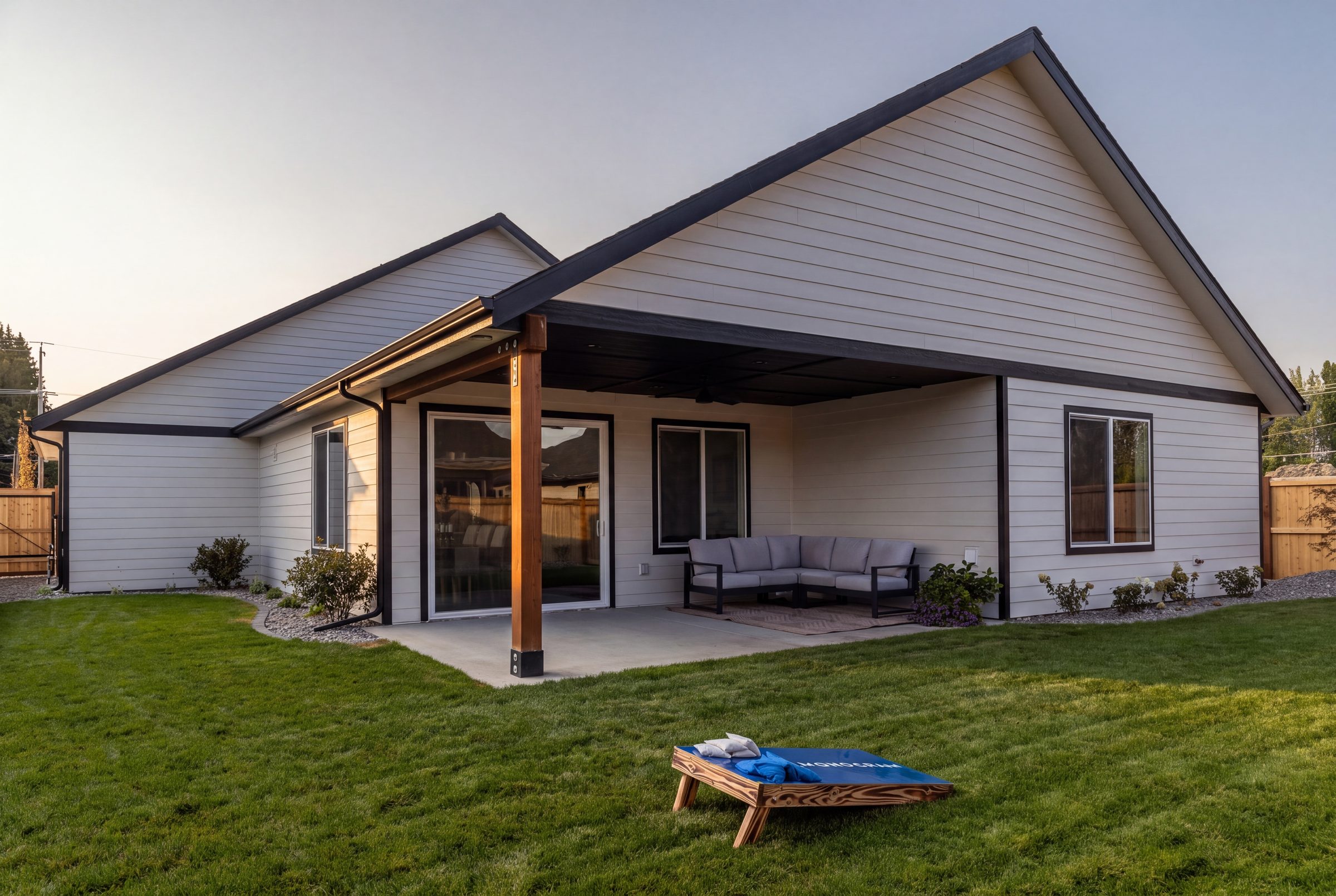 The back of the home and the covered patio